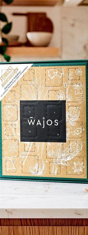 Wajos Adventskalender Gourmet & Gewürz 2026 (Feinkost Adventskalender) in Grün und Gold mit weihnachtlichen Illustrationen, 24 Türchen und zentralem Wajos-Logo.